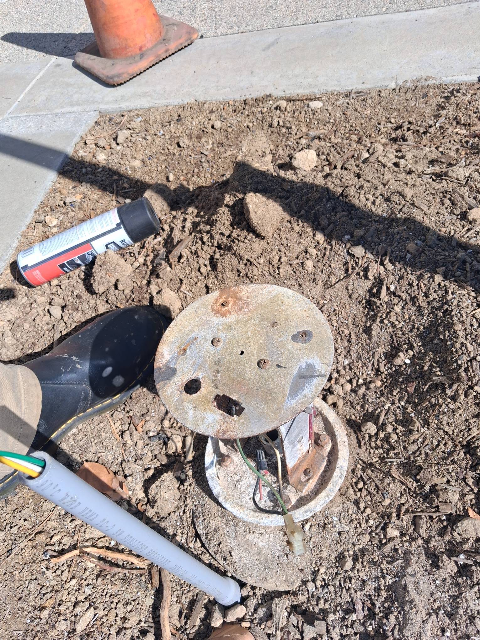 Light pole base plate wiring on a concrete footing